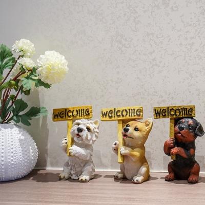 China Europe Garden Dog Statue Resin Puppy Figurine Sculpture Dog Welcome Sign 14x11x20CM for sale