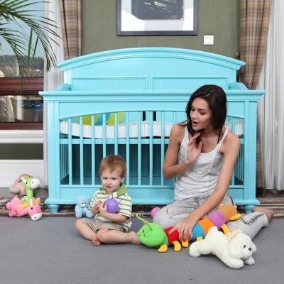 China Hot Selling Luxury White Baby Carry Cot 3 Position Height Adjustment Cribs Wooden Multi Functional Eco-Friendly Designs for sale