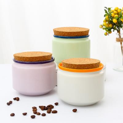 China Custom logo freshness preservation ceramic storage jar with cork lid porcelain kitchen storage jars for food for sale