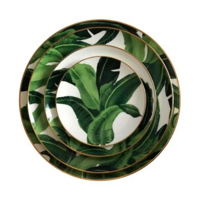 China Viable Hot Selling Gold Rim Banana Leaf Wedding Hotel Style Ceramic Dinner Dish Set for sale