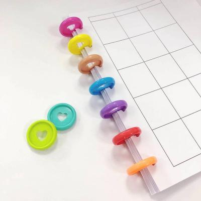 China DIY Disbound Discs Custom Printing Cute Plastic Binder Binding Ring Notebook Planner Discs Customized Size for sale