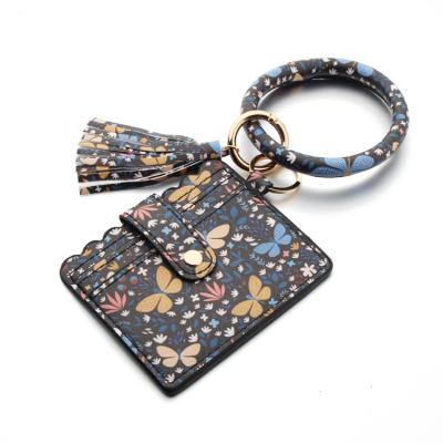 China Cute Waterproof Vintage Print Women Tassel Circle Ring Card Holder Bangle Key Bracelet Wallet Leather Wristband for sale