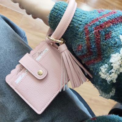 China Waterproof Leather Wallet Wristband Wristband Holder Silicone Credit Card Wristband PU Key Chain With Tassel for sale