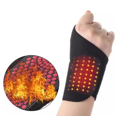 China Magnetic Arthritis High Self-Heating Pain Relief Wrist Brace Tourmaline Elasticity Therapy Sports Protective Brace Belt for sale