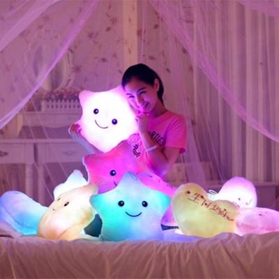 China Hot Sale Flash Toy Glowing Cushion Up Led Light Up Soft Stars Cute Fun LED Star Plush Toys Baby Sit Plush Toy for sale