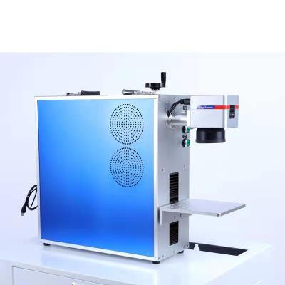 China Air Cooling 20w 30w 50w Fiber Laser Marking Machine For Black Marking On Metal Plastic for sale