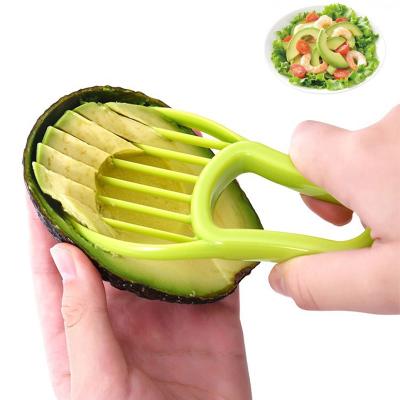 China Sustainable Hot Sale Kitchen Plastic Avocado Slicer Household 3 IN 1 Vegetable Tools Kitchen Instruments for sale