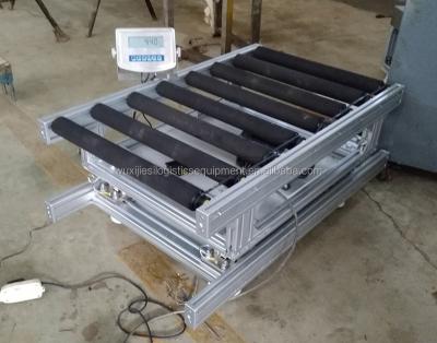 China Heat Resistant Weighing Motorized Roller Conveyor System for sale