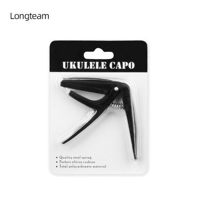 China GUITAR Polyacetal POM ukulele capo change ukulele main accessories mini capo for sale