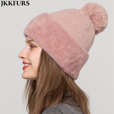 China 2021 New Design COMMON Winter Warm Acrylic Pompom Beanies Hats Pink Faux Fur Hat Women for sale