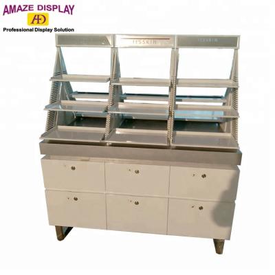 China With cabinet and double sided cosmetic trays makeup mac display stand for sale