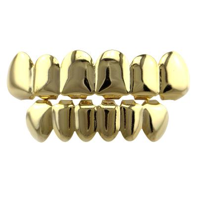 China European Hiphop Fashion Hips Hops Real Gold Plated Teeth Grills Tops Vampire Fangs Lower Teeth Grills Set For Women Men for sale