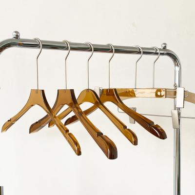 China Customized Various Styles Durable Customized Brown Coat Hanger Acrylic Transparent Clear Coat Hanger For Clothes And Pants for sale