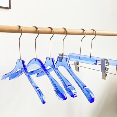 China Custom Logo Adult Transparent With Rod Durable Without Rod Non-Slip Blue Color Acrylic pants hanger with gold clips for sale