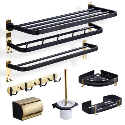 China Wall Mounted Type 2022 New Bathroom Set Black Gold Bathroom Accessories Towel Rack Tissue Box Toilet Brush Multi-piece Set Organizer for sale