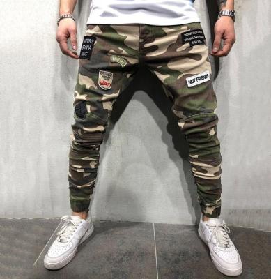 China XJYD New Style Pleated Mens Trotter Pants Patch Label Camouflage Cargo Jeans Male Camouflage Denim Pants for sale