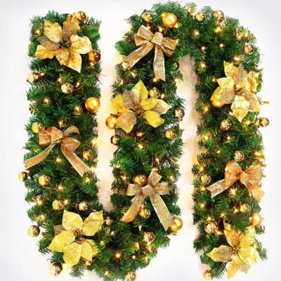 China Beautiful 9ft Christmas Flower Bowknot Decorated Led Pre Lit Artificial Wholesale Christmas Wreath for sale