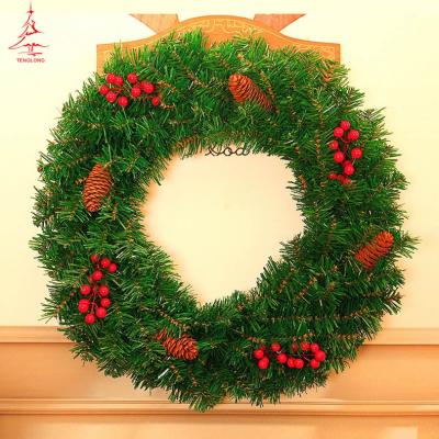 China Beautiful Wholesale Christmas Door Ornament Red Berry Christmas Wreath Pine Cones for sale