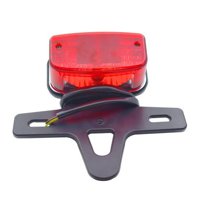 China 12V ABS Motorcycle Tail Light China Cabbage HJ125L Rear Brake Light Halogen Bulb for sale