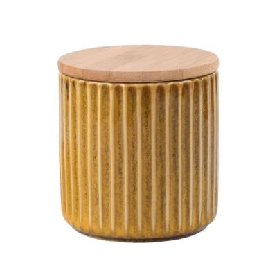 China ECO-frendly cheap cylinder clay ceramic luxury candle containers with wooden lids for sale