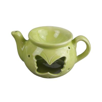 China Wholesale Shape Eco-friendly Ceramic Wax Teapot Aroma Warmer With Butterfly Design for sale