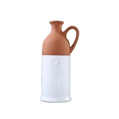 China Eco - Friendly Wholesale Ceramic Terracotta Wine Bottle Champagne Bottle for sale