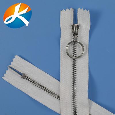 China Nickel-free metal zipper pull tab silver teeth no. 5 closed tail zipper gold teeth gun teeth color used on clothing coat for sale