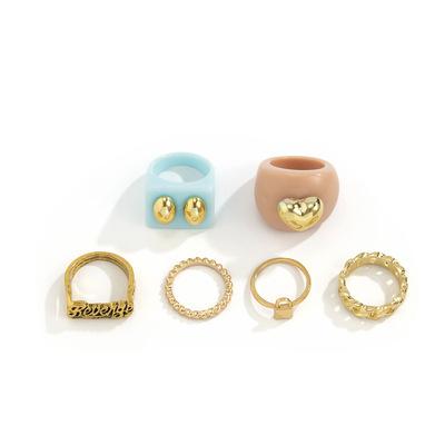 China TRENDY Simple Candy Color Acrylic Inlaid Joint Ring Retro Geometric Hollowed Out Alloy Letter Love Ring for sale