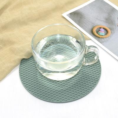 China Sustainable Hot Sale 17.3 cm by 6mm Thickness Silicone Material 100% Silicone Pot Pad Place Table Mat Hot Certificated for sale