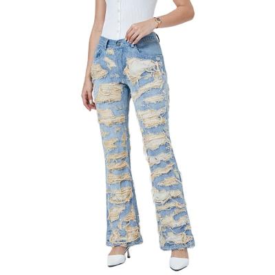 China New OEM women skinny ripped boot cut jeans high quality denim rocket pants for women fashionable embroidered women ripped jeans with holes for sale