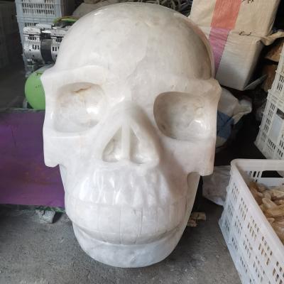 China China Wholesale Large Size 546.5kg Natural Hand-carved Crystals White Skulls Decoration Hand-carved Hot Selling for sale