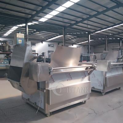 China All-Oil/Oil-Water Technology Fried Chicken Chip Continuous Conveyor Industrial Commercial Gas Mixing Deep Fryer Frying Machine for sale