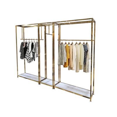 China Retail Store Furniture Retail Store Fixture Hanging Clothes Store Design Metal Gold Custom Clothing Dress Display Rack for sale