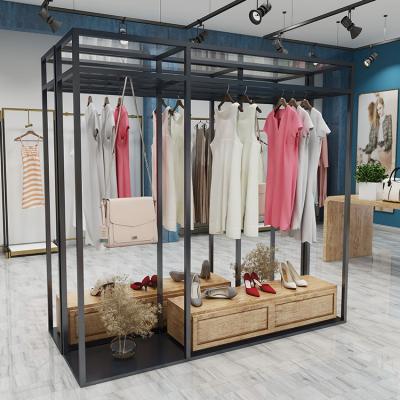 China Custom Black Retail Stores Boutique Clothing Store Display Stand Decoration Metal Display Rack For Clothing Store for sale