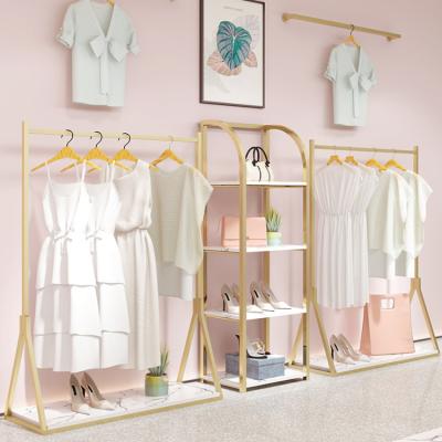 China Eco-friendly Gold Material Garment Rack Clothing Display Rack For Clothing Storage Clothes Shop Fittings for sale