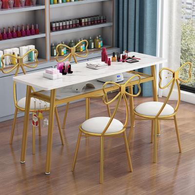 China New Popular Cheap Table And Chair Set Technology Nails Salon Manicure Desk ArLamps Nail Station Dust Collector Bar Stool Used Nail Tables for sale