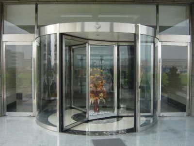 China Automatic Rotating Doors with Stainless Steel Frame for Hotel Entrances for sale