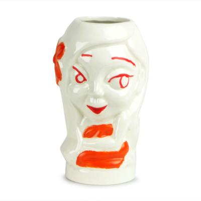 China Custom Viable Porcelain Wholesale Ceramic Tiki Mug Shiny Glazed Fancy Coffee Mug Polynesian Dance Girl Mug for sale