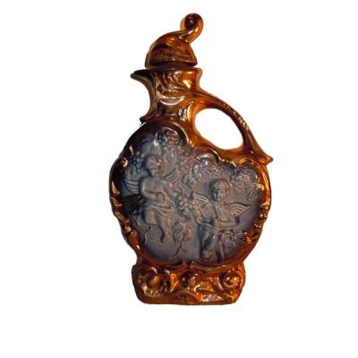 China No ceramic whiskey decanter with twin angels on the front for sale