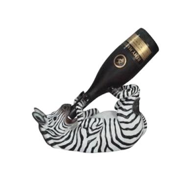 China Decorative Wine Stand Home Decor Novelty Resin Zebra Wine Bottle Holder for sale