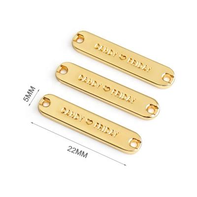 China Sustainable Cap Swimwear Bikini Clothing Accessories Gold Plated Small Metal Logo Plate Tags, Custom Sewing Metal Clothes Labels For Apparel for sale