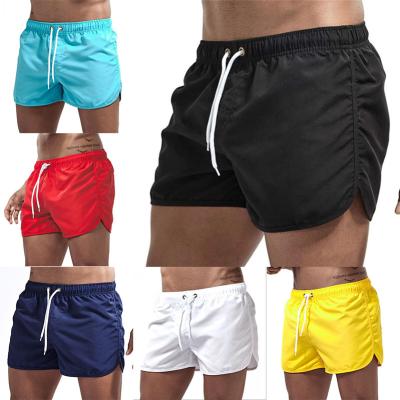 China QUICK DRY Summer Warm Drawstring Pockets Simple Swim Trunks Men Beach Shorts Without Liner Pockets for sale