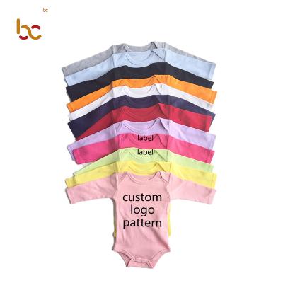 China Cozy Baby Clothes Low Moq 0-3T Solid Color Unisex Boy And Girl Romper Baby Onesie 100% Cotton Button Long Sleeves Newborn Jumpsuit Toddlers Romper for sale