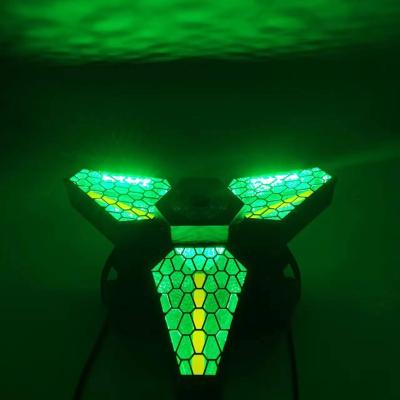 China Introduces Qixin 3x60W 2022 Strobe Triangle Retro Infinitely Rotating Maple Leaf Triangle Led Lighting Mantis Stage Light for sale