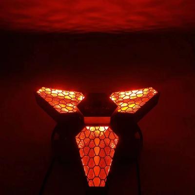 China Introduces Qixin 2022 new bar light club triangle infinitely rotating maple leaf retro background led light for sale