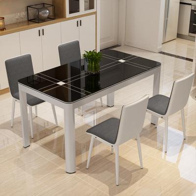 China Modern Design Convertible Multifunctional Black Glass Dining Table With Chairs for sale