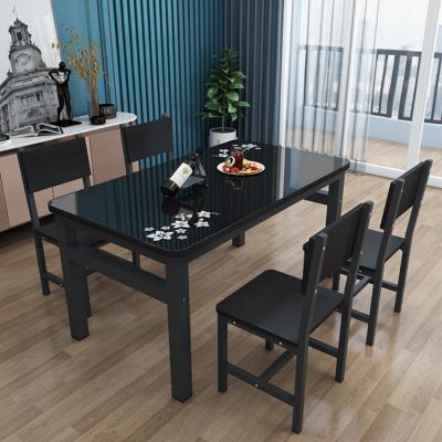 China Modern Minimalist Extendable Rectangle Tempered Glass 6 Chair Dining Table Set for sale