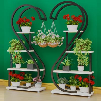 China Modern Creative Heart-shaped Flower Stand Living Room Wrought Iron Multilayer Rack for sale