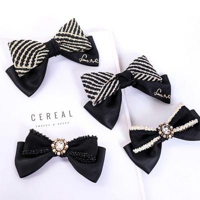 China New Products Fashion Lady Horsetail Spring Clip Diamond Pearl Duckbill Clip Hairpin Bowknot Hairpin for sale