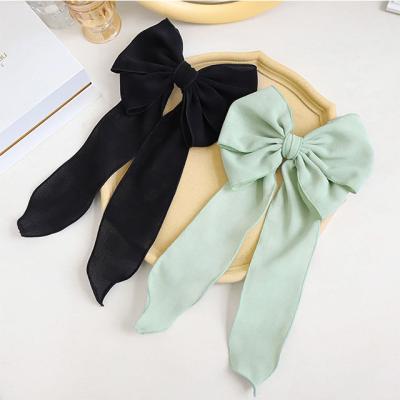 China Fashion Retro New Product Hairpin Solid Color Cloth Bow Long Sliver Fashionable Female Ponytail Spring Clip Top Clip for sale